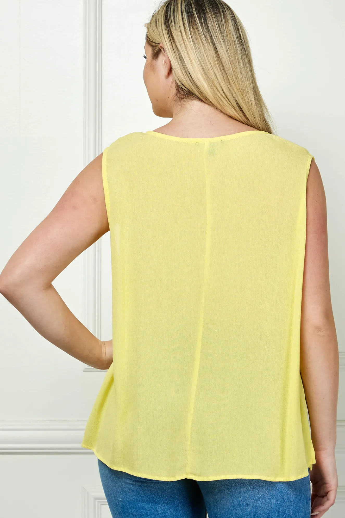 Sleeveless Embroidered Yoke Split Neck Blouse in Yellow - Plus