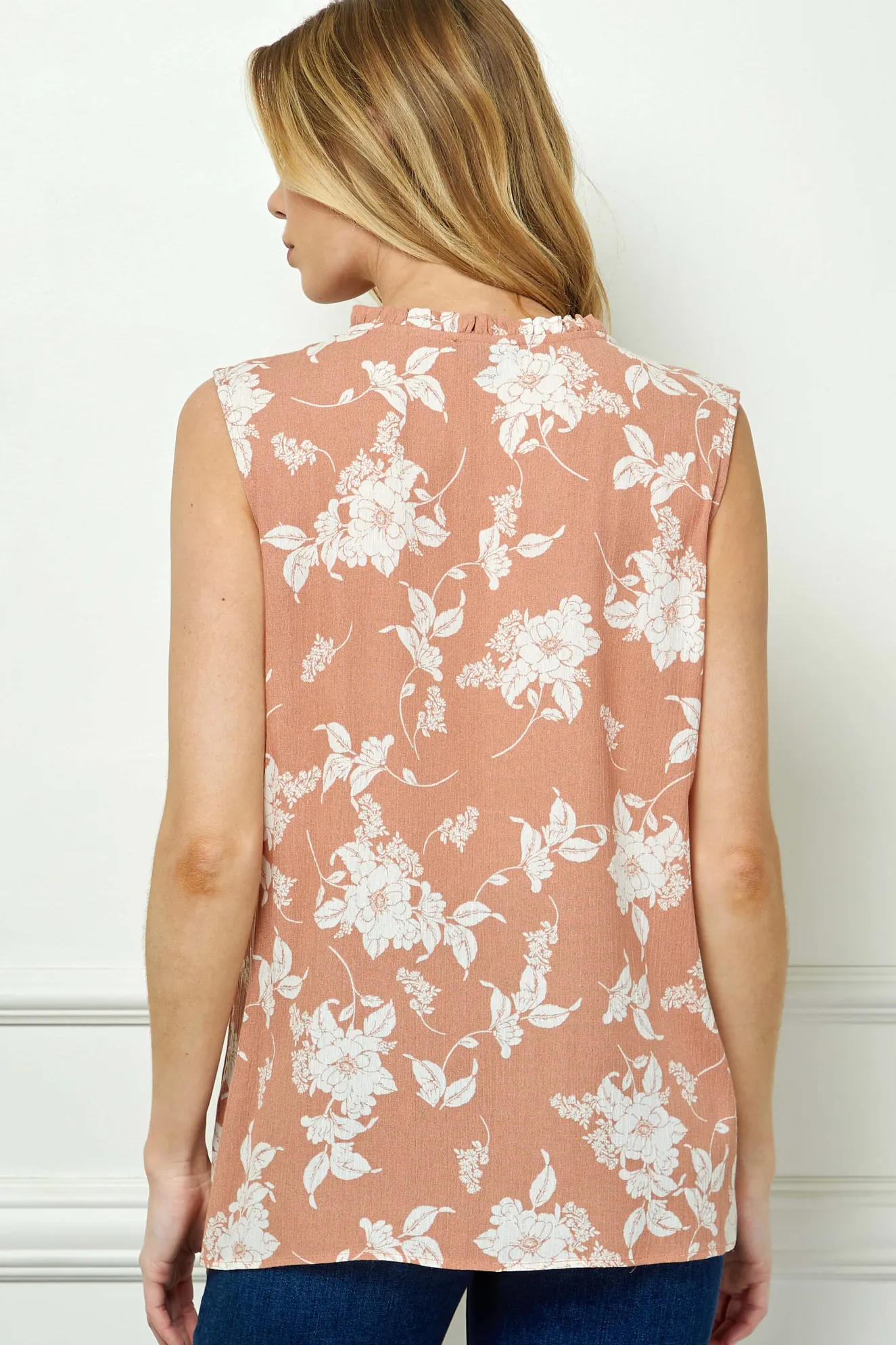 Sleeveless Ruffle Split Neck Tassel Blouse in Coral